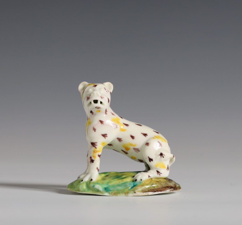 A FRENCH SOFT-PASTE MODEL OF A LEOPARD