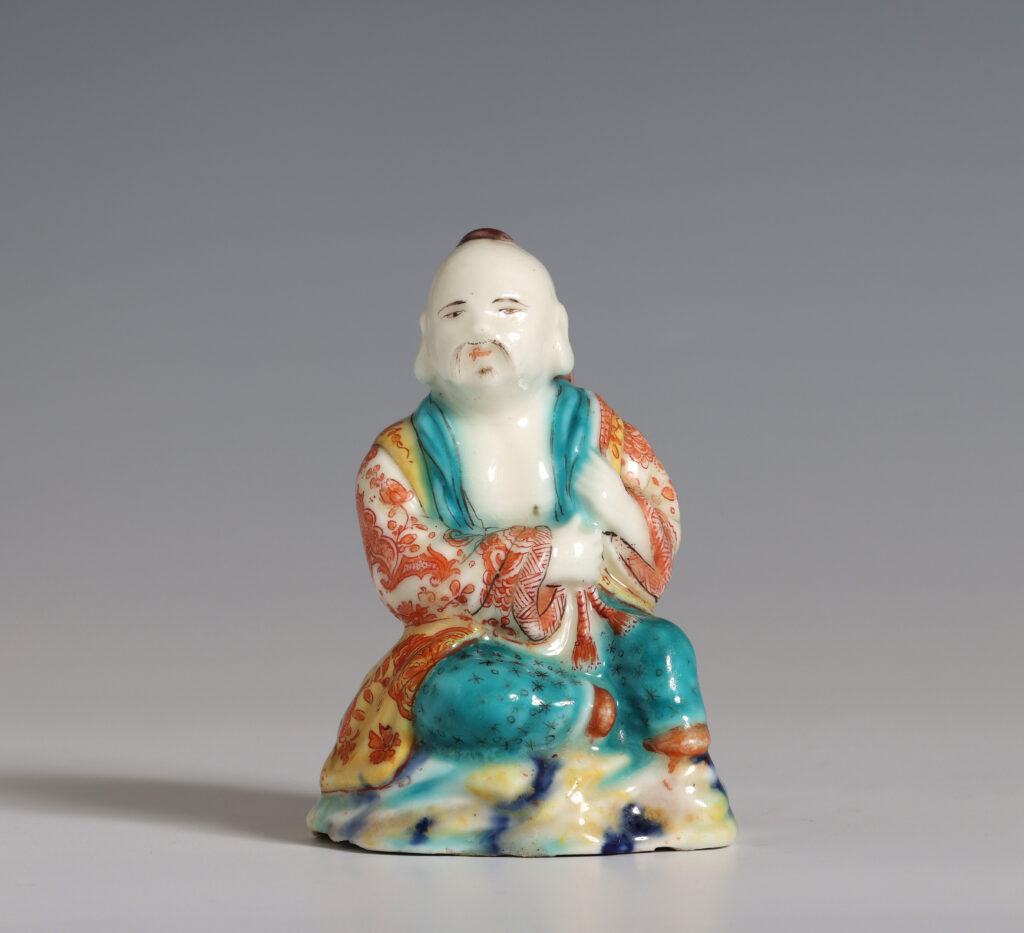 A FRENCH SOFT PASTE FIGURE OF JAPANESE MAN