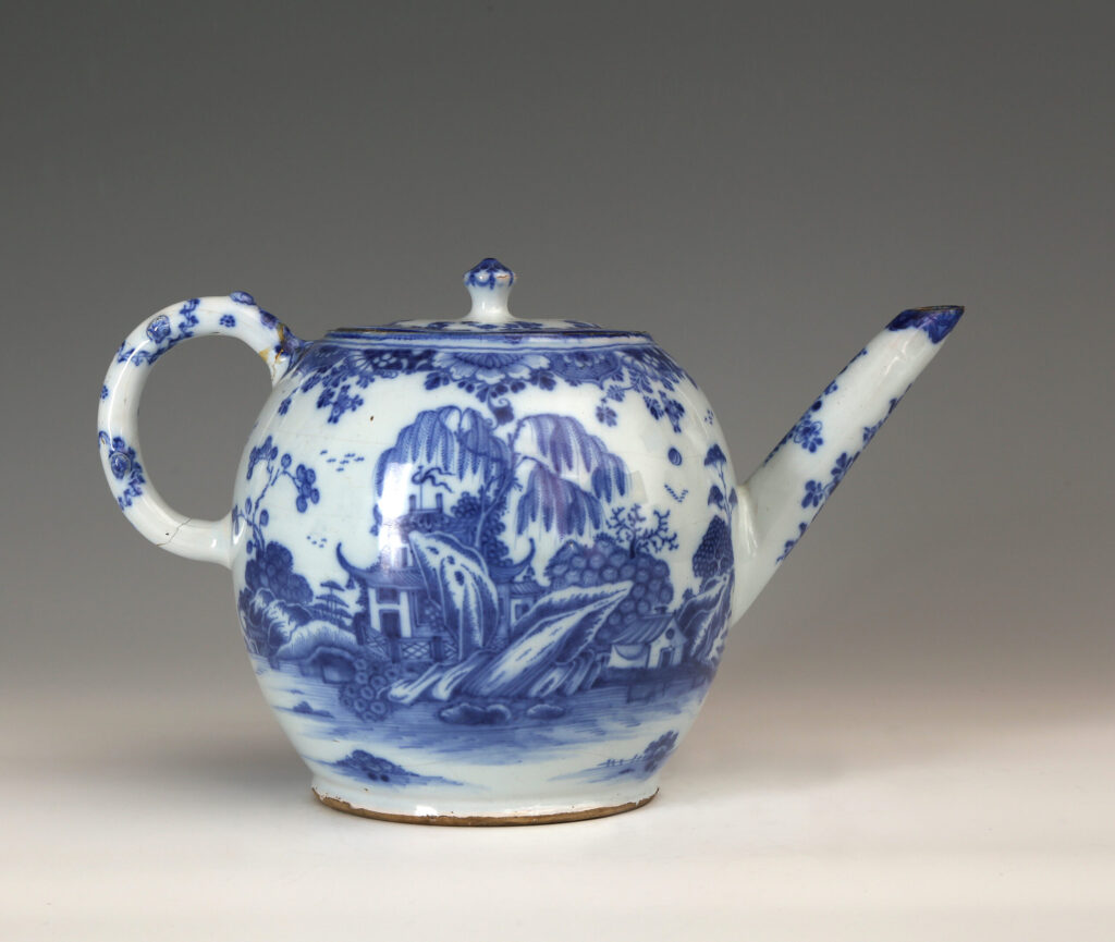 A BRITISH DELFT PUNCH POT