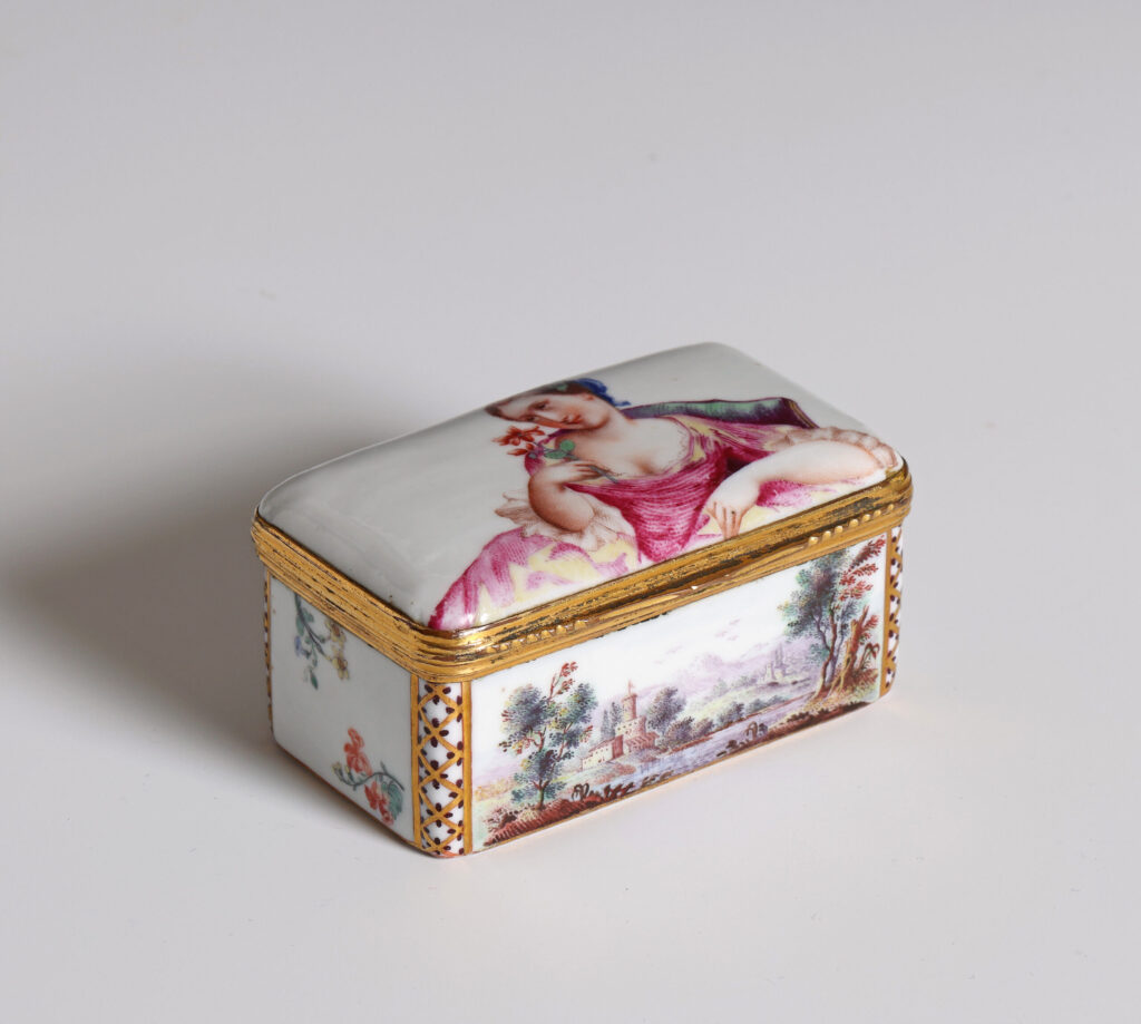 A DOCCIA PORCELAIN GILT-METAL MOUNTED SNUFF BOX