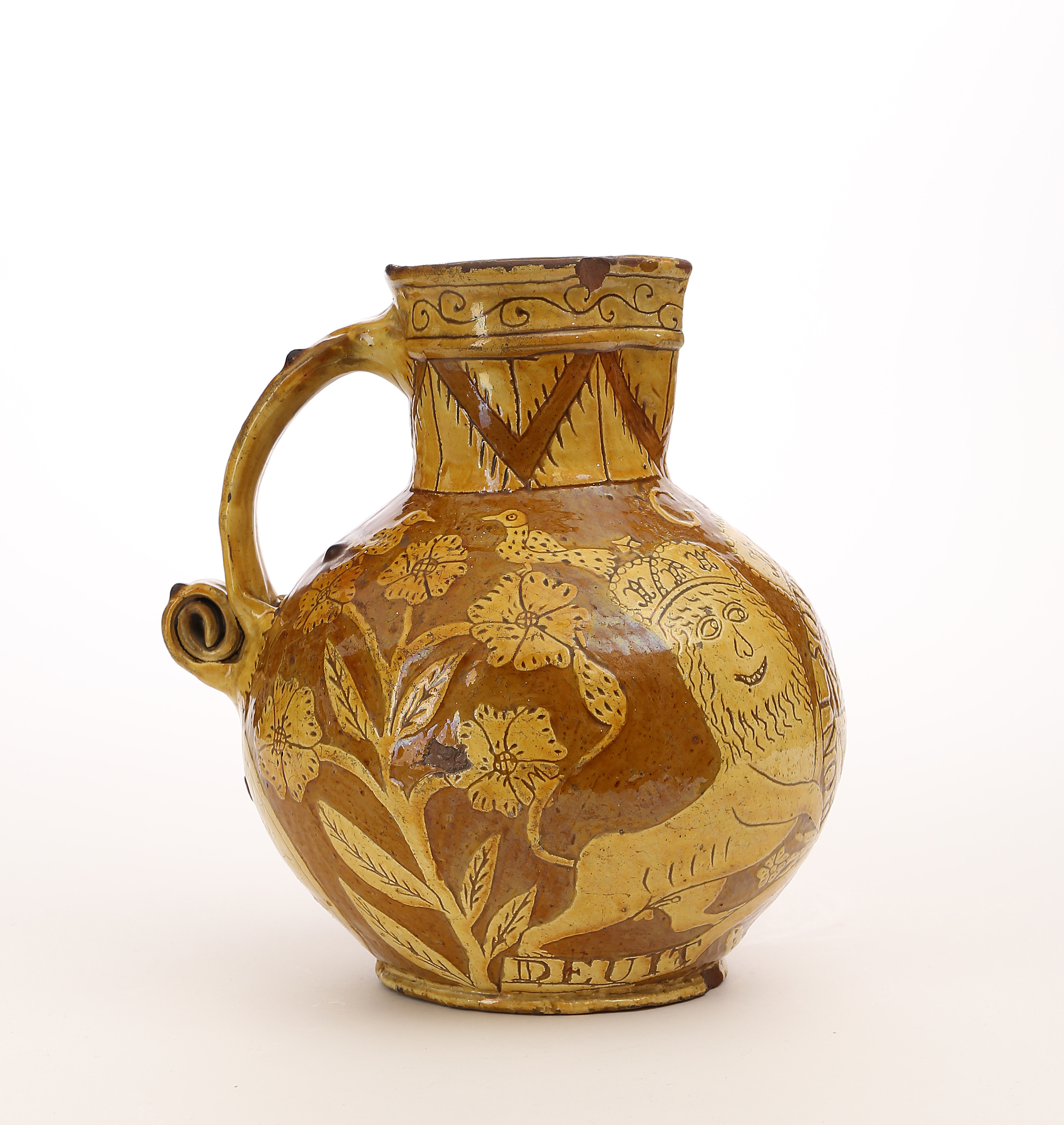 A SMALL DEVON SLIPWARE DATED HARVEST JUG