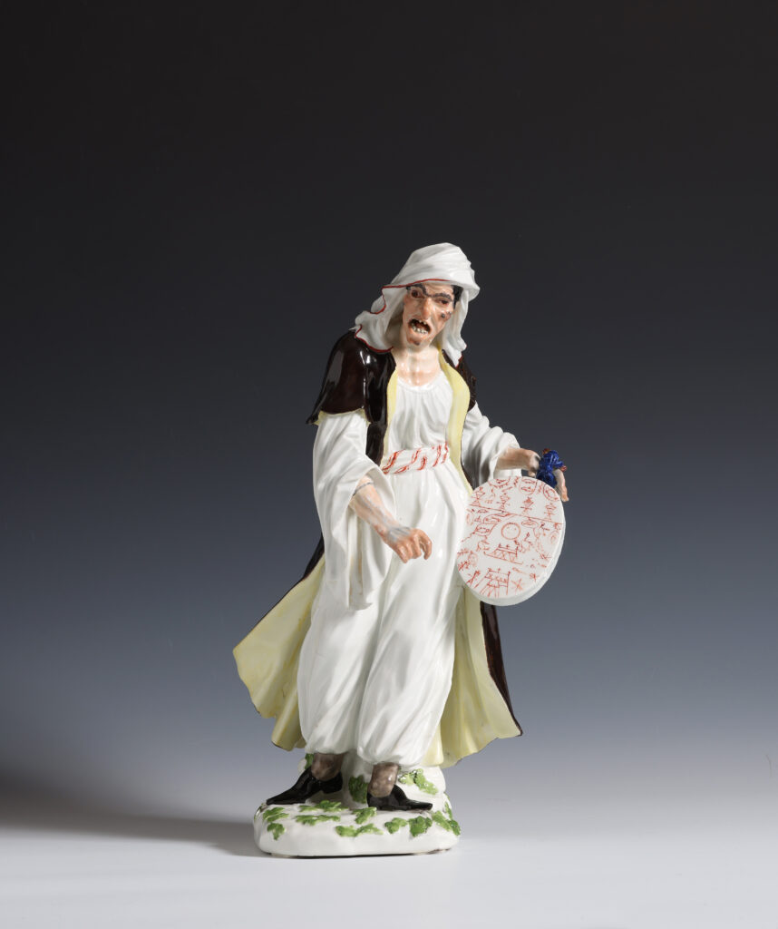 A MEISSEN FIGURE OF AN SORCERESS
