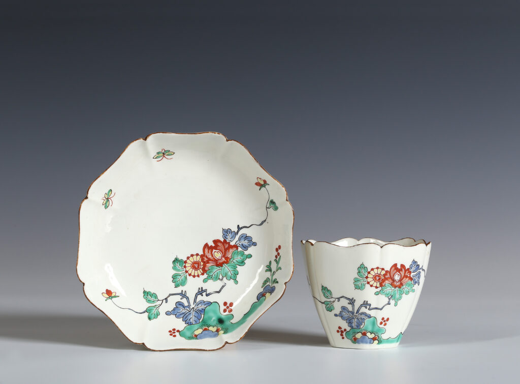 A CHANTILLY BEAKER AND SAUCER